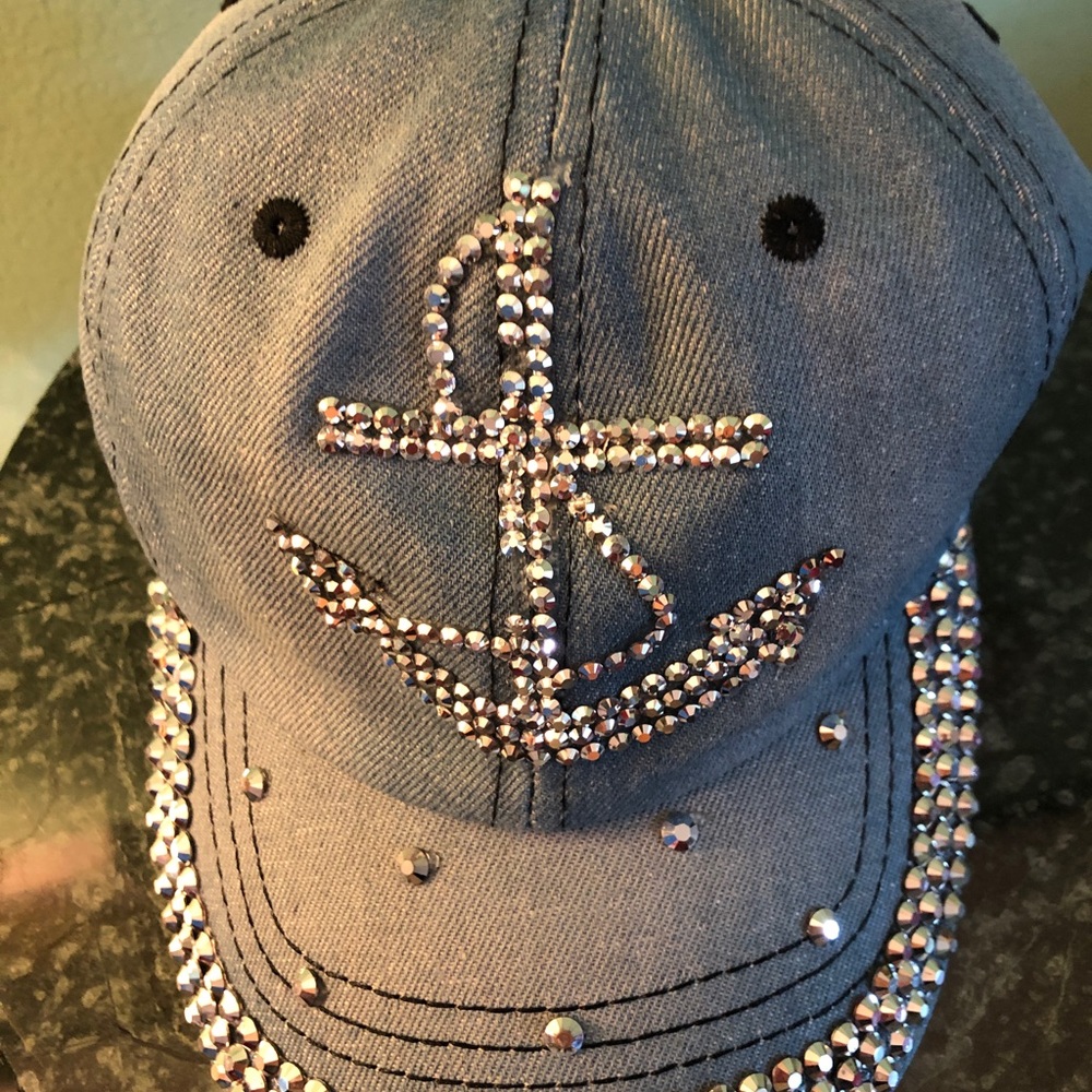 Ladies denim cap with rhinestones. Cruise club brand.Adjustable back.$20.